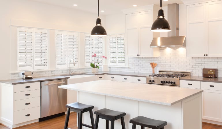 Plantation shutters in a bright Chicago kitchen.